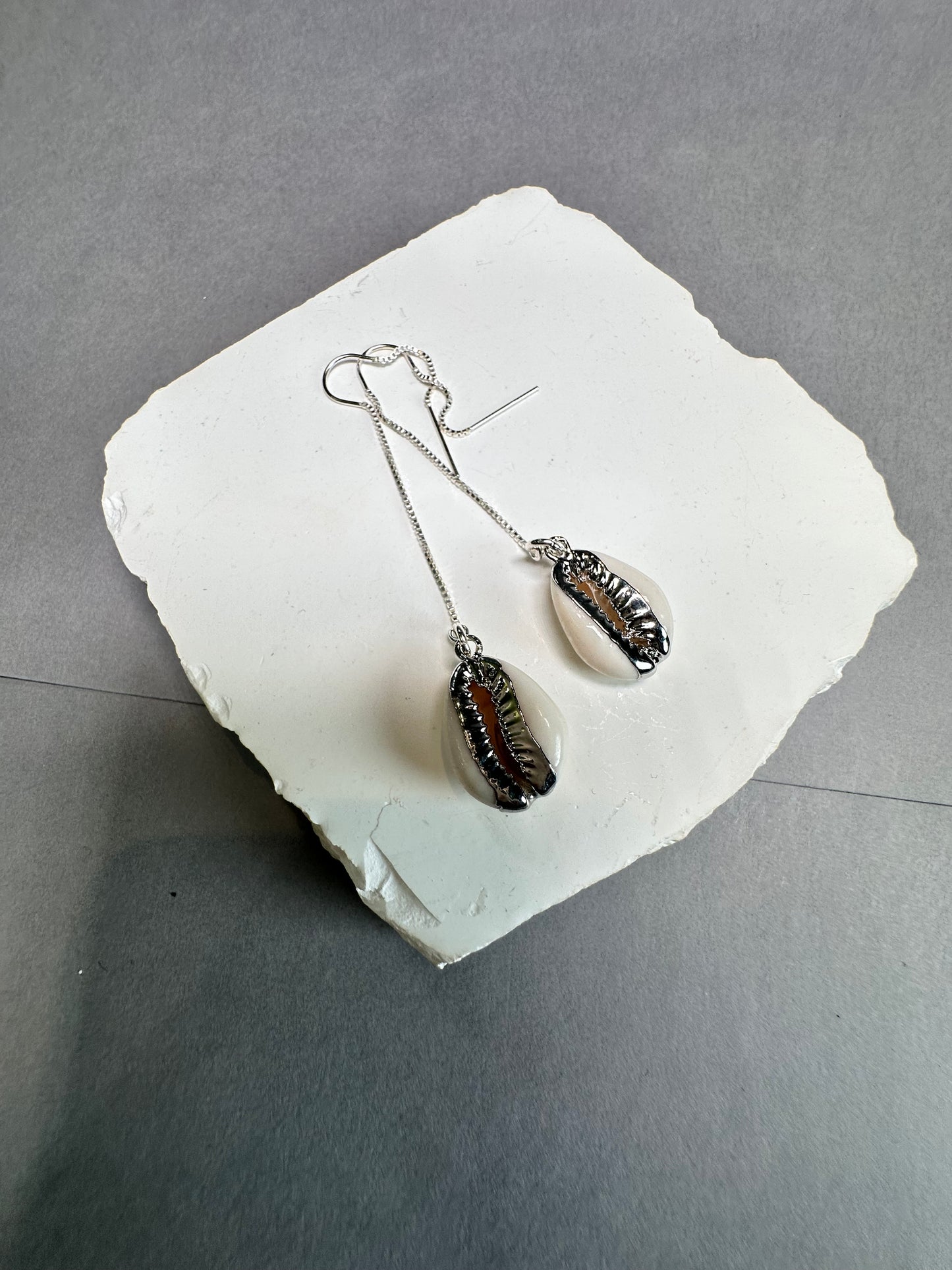 Silver cowrie threaders