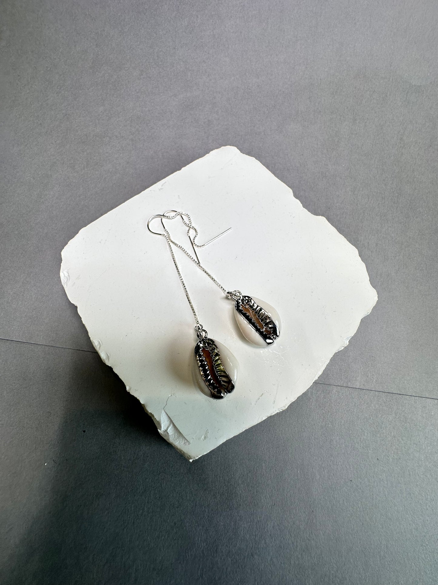 Silver cowrie threaders