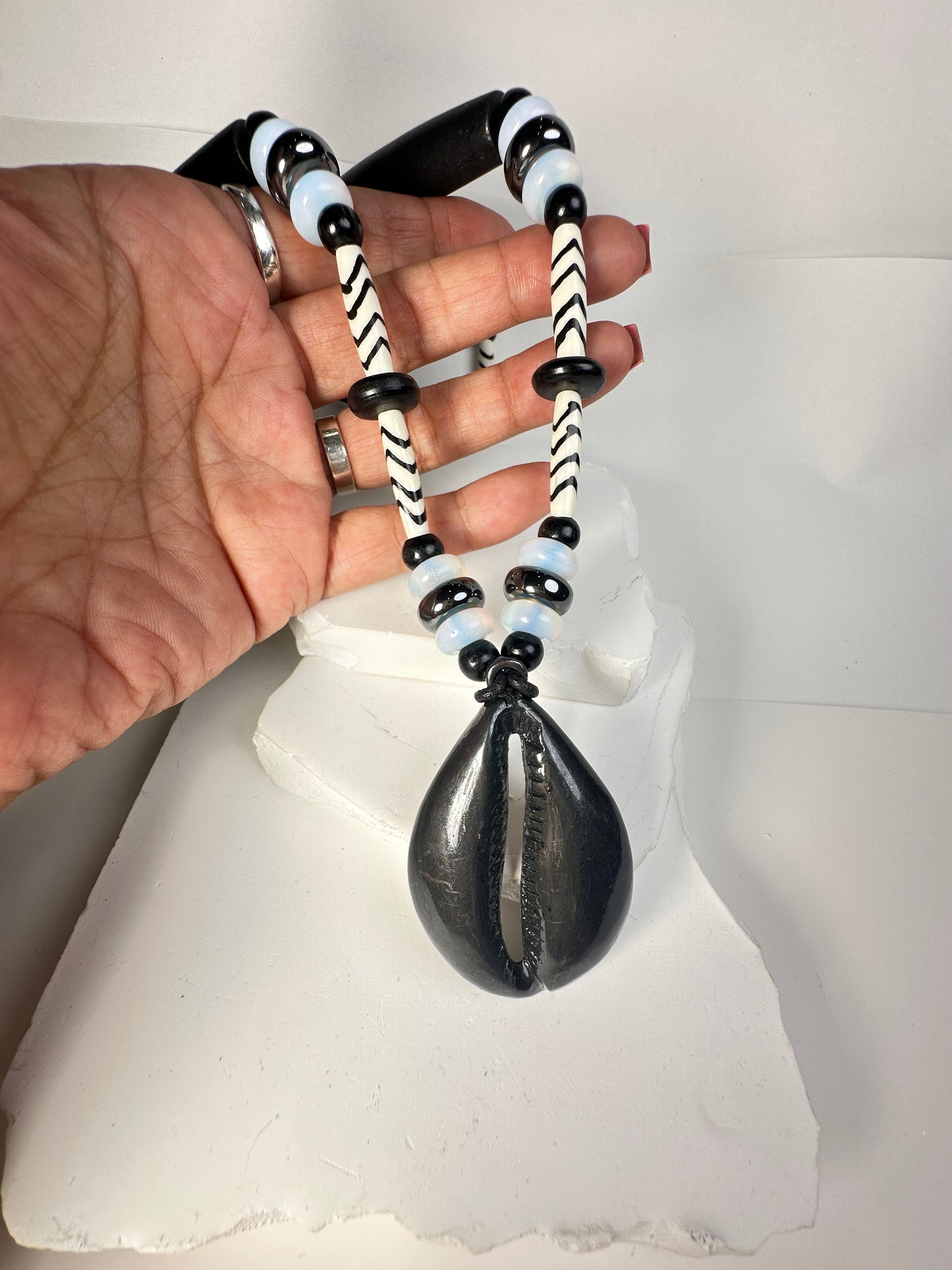 Black Cowry on Cording
