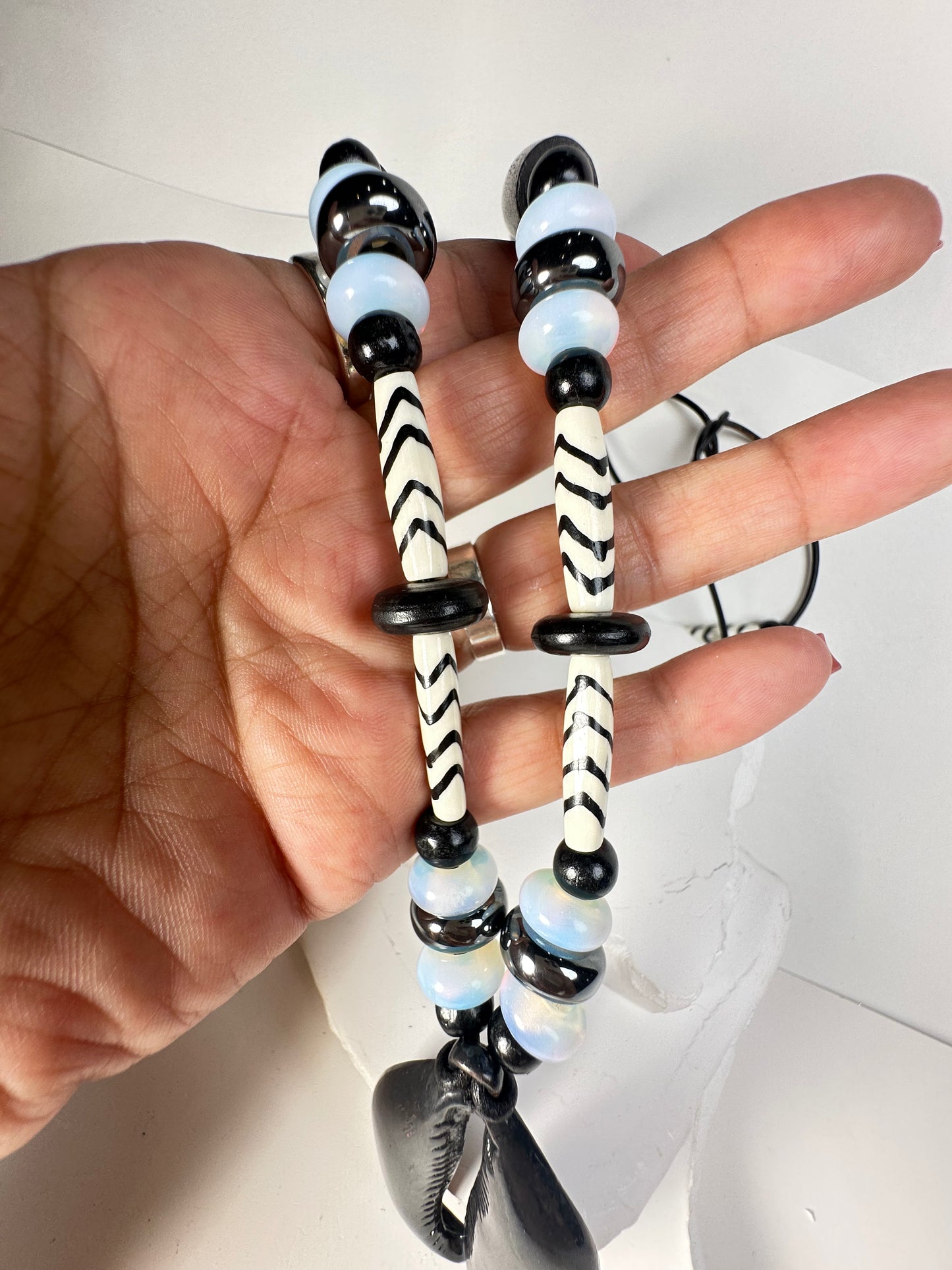 Black Cowry on Cording