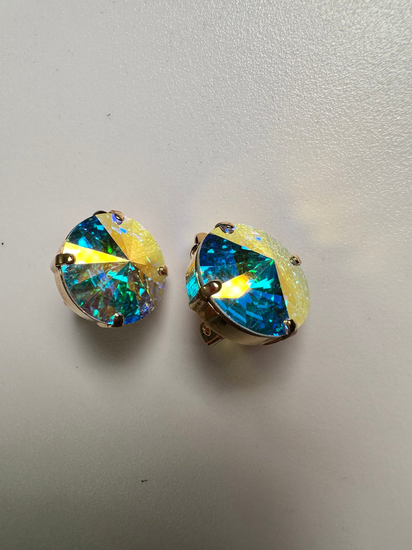 Gold Shade Crystal Drops clip on’s in Silver finish setting.