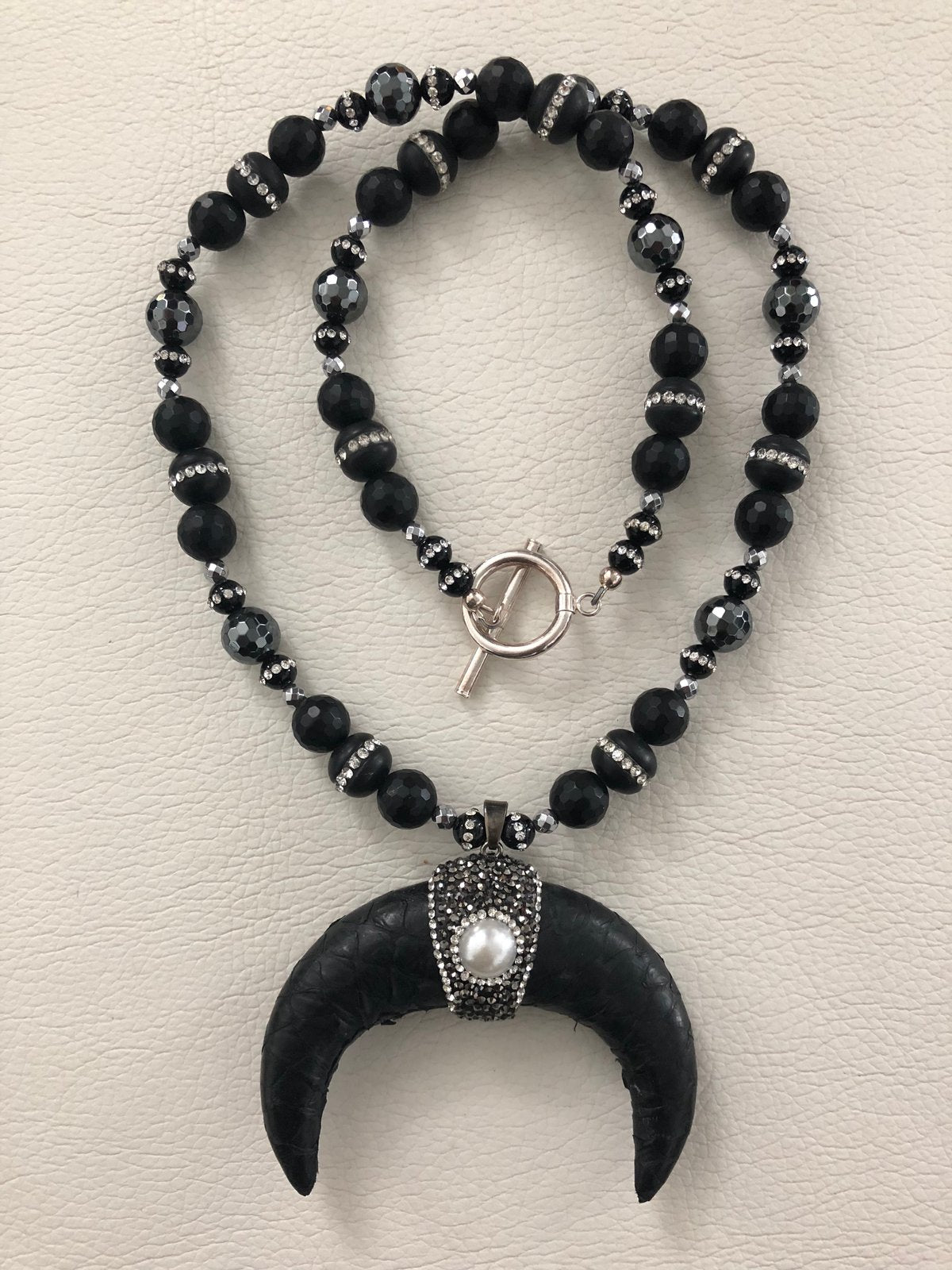 Black Leather horn w/ hematite and pearl detail (LAST ONE)