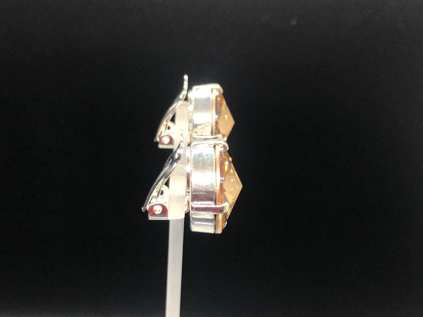 Gold Shade Crystal Drops clip on’s in Silver finish setting.