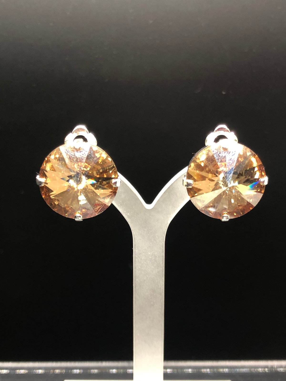 Gold Shade Crystal Drops clip on’s in Silver finish setting.