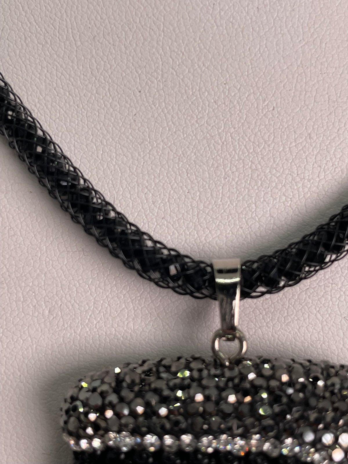 Black Buddha face with Hematite crystals