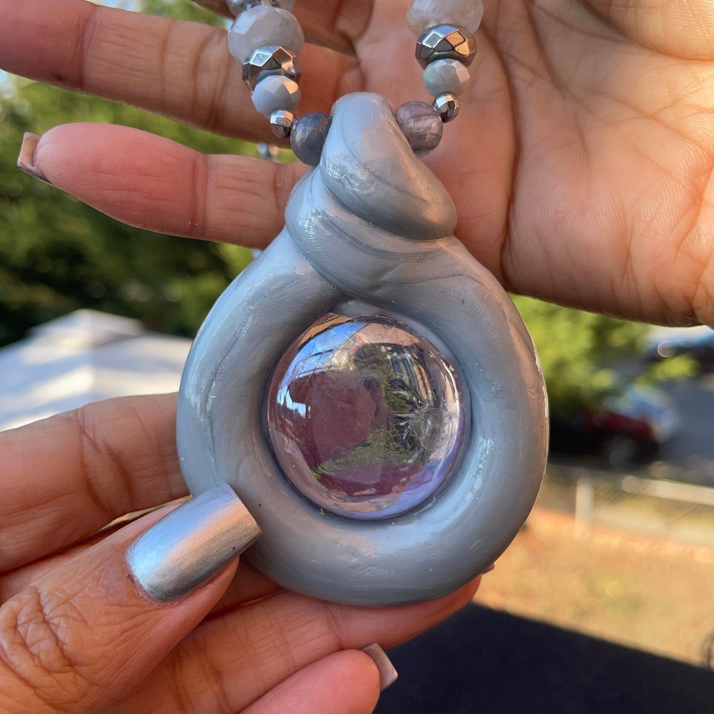 Grey/silver “Doo-nut” necklace w/Clear glass stone