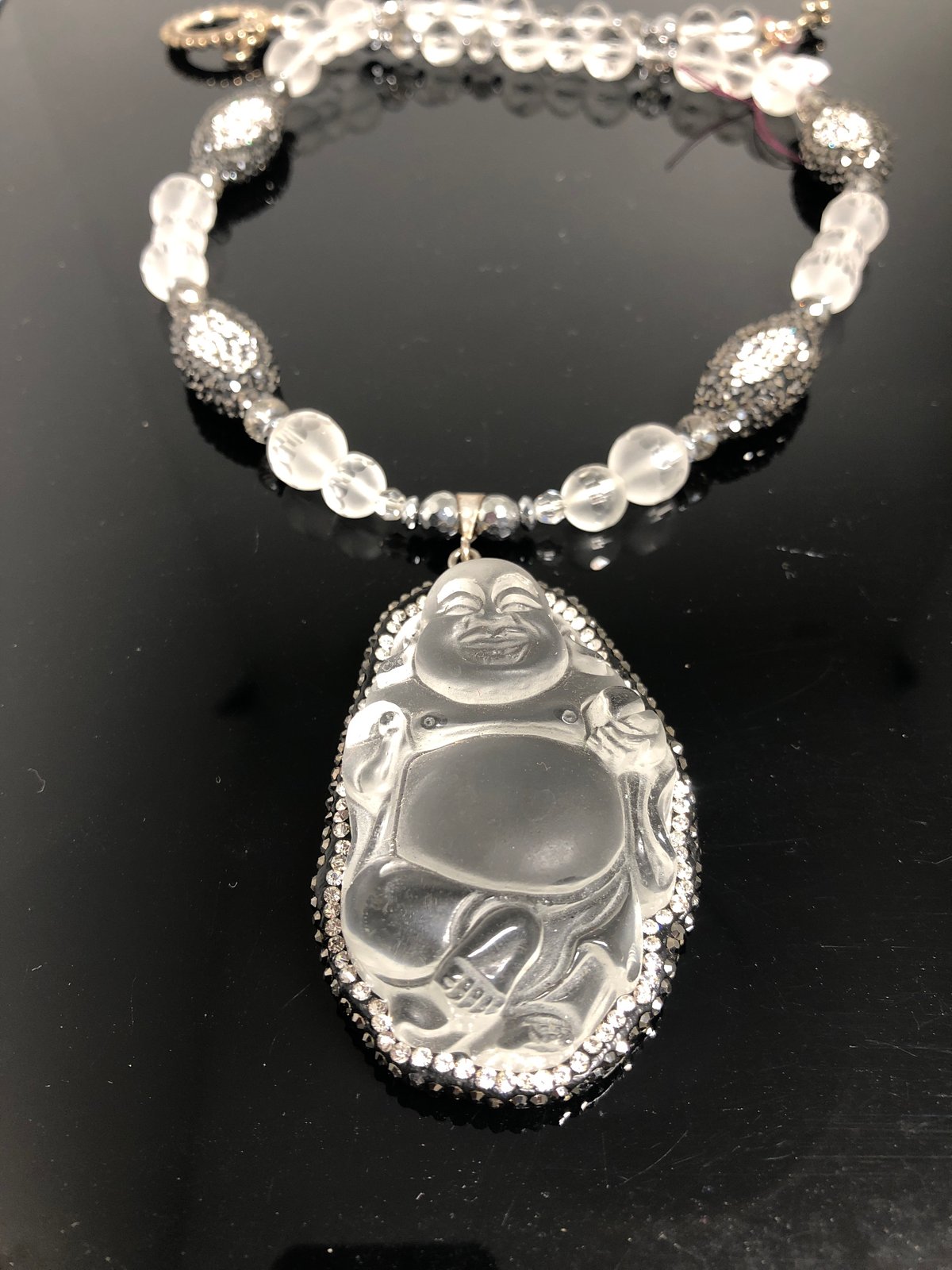 Clear “water” full body Buddha trimmed in crystals