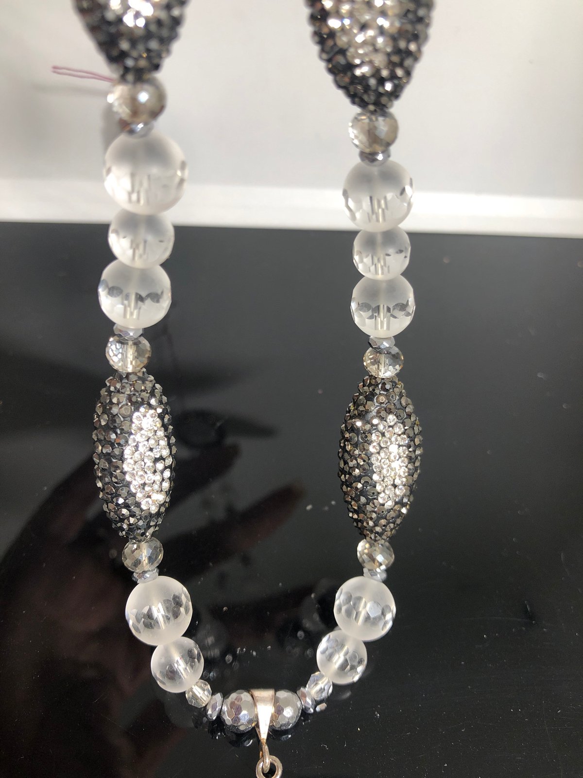 Clear “water” full body Buddha trimmed in crystals