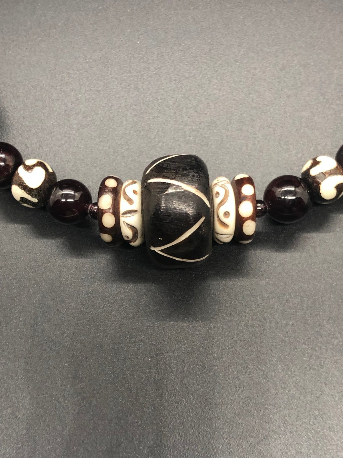 Mud bead and garnet bracelet