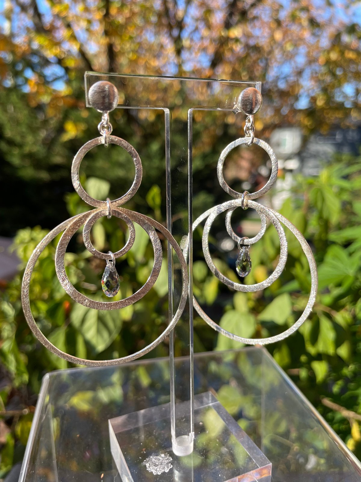 Sylver Brushed multi hoops with teardrop Crystal Dangle post back.