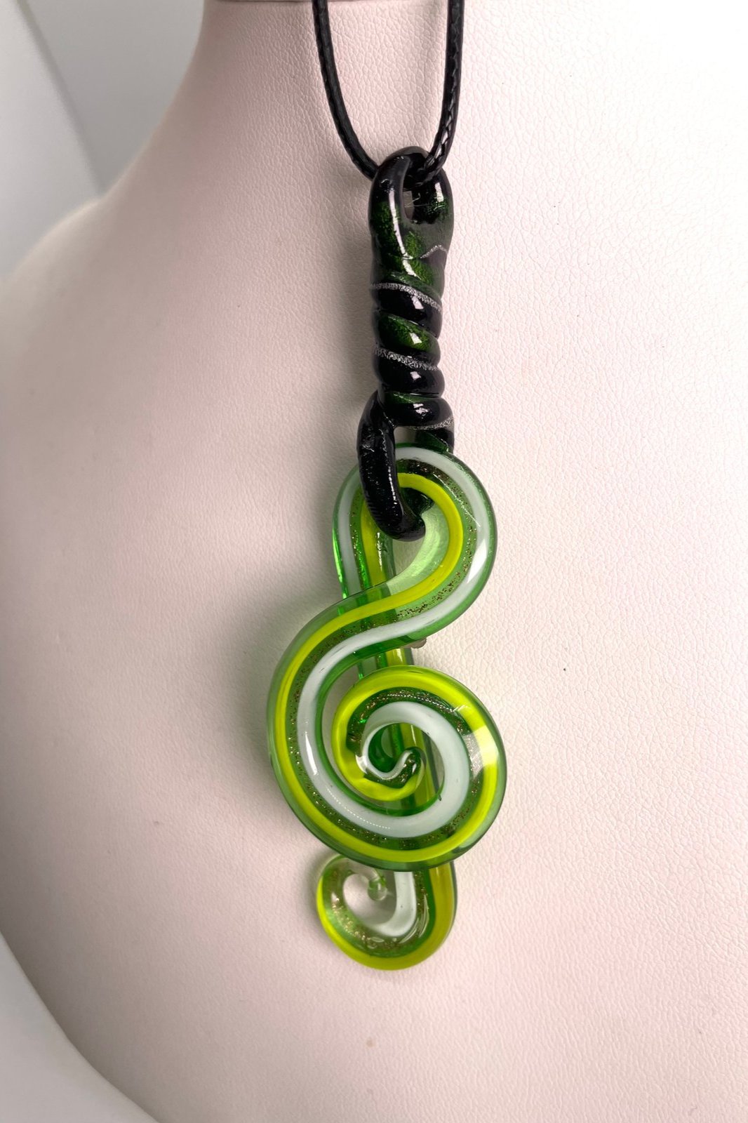 White green blown glass treble clef with through loop top wrap