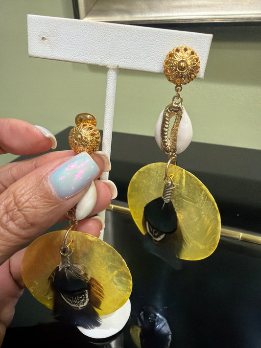 Yellow disc with feathers, Cory shell clip ons