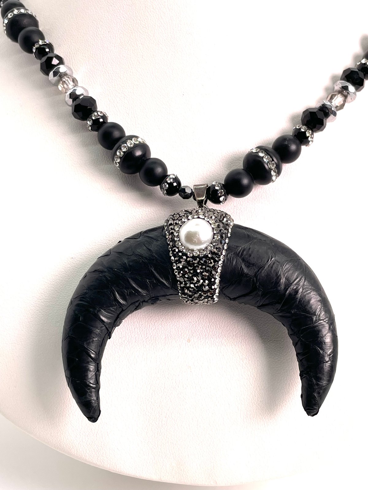 Black leather horn with pearl hematite centerpiece Beaded in Matt Alex and encrusted onyx, hematite.