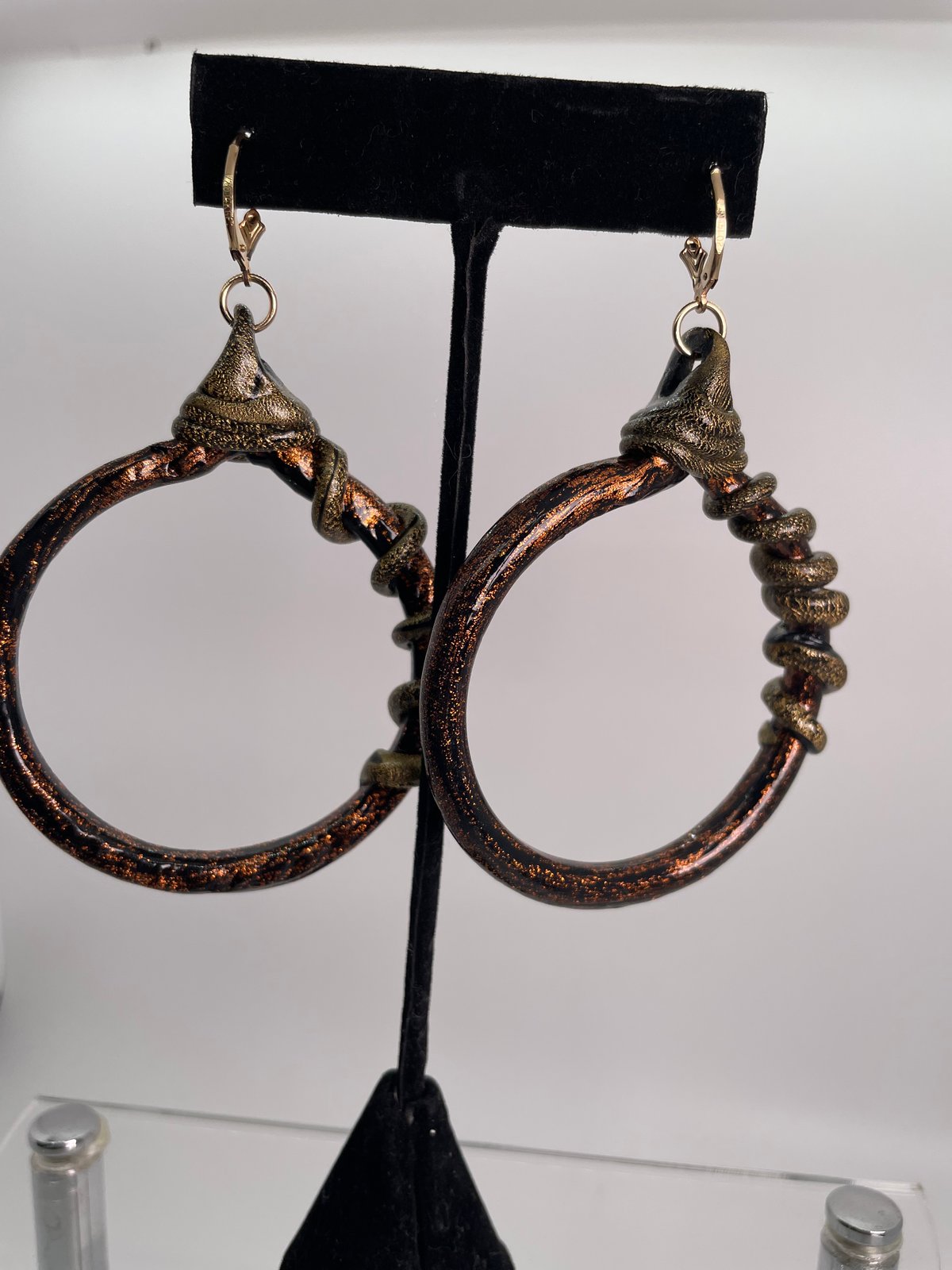Brown and bronze hoops with twist accent, gold lever backs