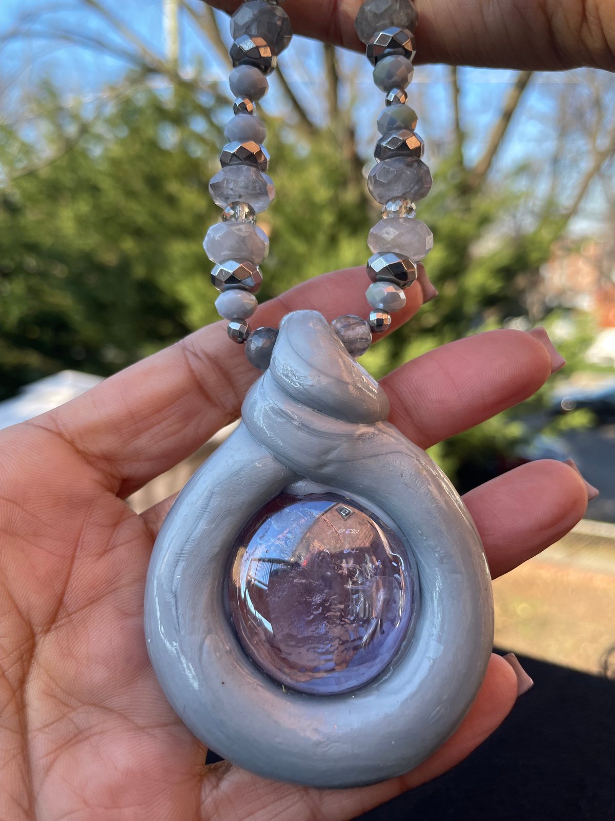 Grey/silver “Doo-nut” necklace w/Clear glass stone