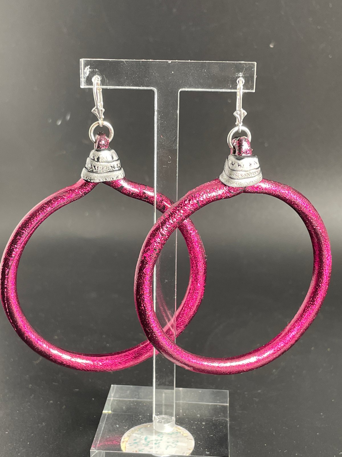 Large Wine/fuchsia Hoops with silver top details. 