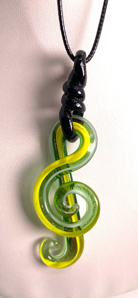 Light green treble clef Set in black