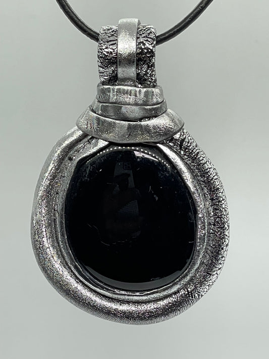 Silver turtle with black glass stone
