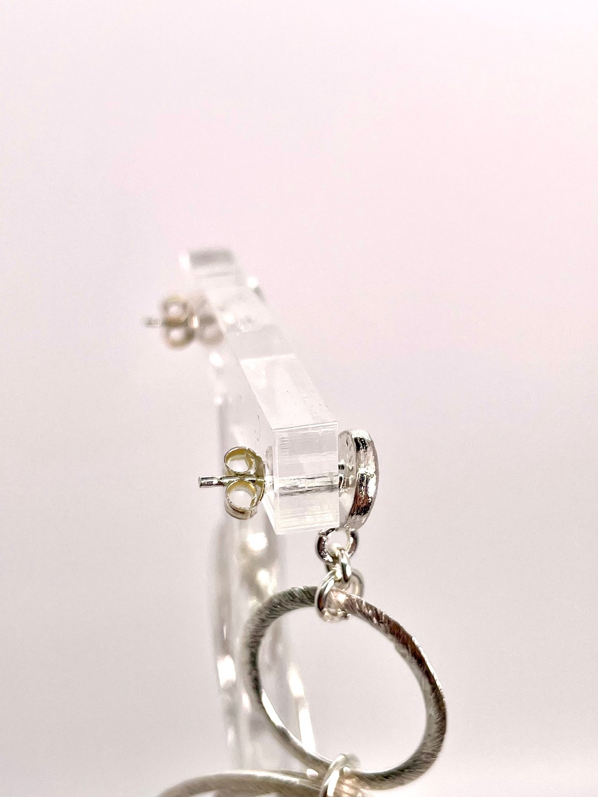 Sylver Brushed multi hoops with teardrop Crystal Dangle post back.