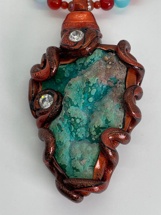 Turquoise Africa set in copper beated in turquoise and carnelian