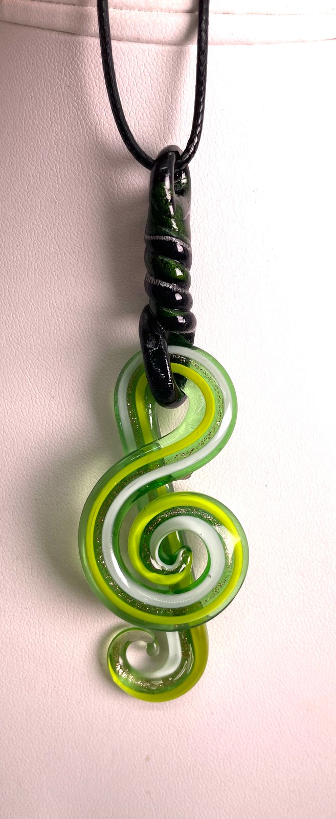 White green blown glass treble clef with through loop top wrap